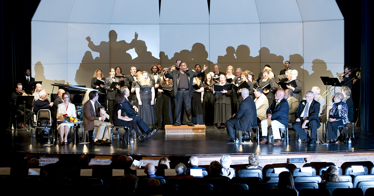 A KCC choir performs in the Binda Performing Arts Center.