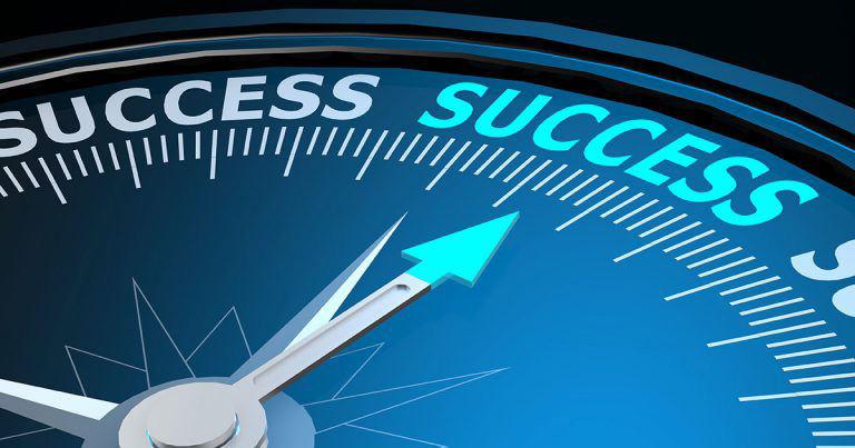 Illustration of a compass and the word "success."